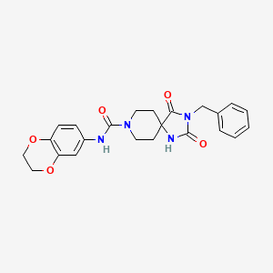 molecular formula C23H24N4O5 B3203675 3-benzyl-N-(2,3-dihydrobenzo[b][1,4]dioxin-6-yl)-2,4-dioxo-1,3,8-triazaspiro[4.5]decane-8-carboxamide CAS No. 1021264-49-2