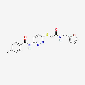 molecular formula C19H18N4O3S B3203692 N-(6-((2-((furan-2-ylmethyl)amino)-2-oxoethyl)thio)pyridazin-3-yl)-4-methylbenzamide CAS No. 1021264-79-8