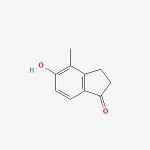 molecular formula C10H10O2 B3204246 5-Hydroxy-4-methyl-2,3-dihydroinden-1-one CAS No. 103203-78-7