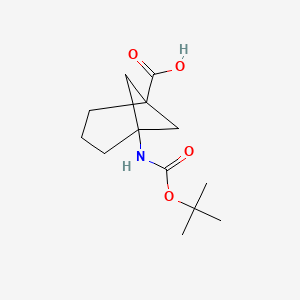 molecular formula C13H21NO4 B3204379 5-{[(Tert-butoxy)carbonyl]amino}bicyclo[3.1.1]heptane-1-carboxylic acid CAS No. 1035325-28-0