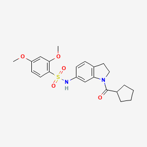 molecular formula C22H26N2O5S B3205861 N-(1-(cyclopentanecarbonyl)indolin-6-yl)-2,4-dimethoxybenzenesulfonamide CAS No. 1040658-97-6
