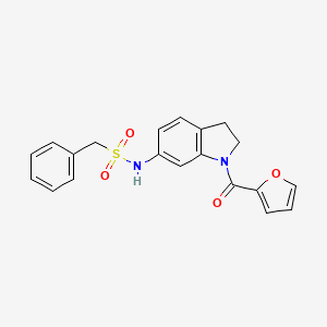molecular formula C20H18N2O4S B3205988 N-(1-(furan-2-carbonyl)indolin-6-yl)-1-phenylmethanesulfonamide CAS No. 1040661-97-9