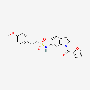 molecular formula C22H22N2O5S B3205993 N-(1-(furan-2-carbonyl)indolin-6-yl)-2-(4-methoxyphenyl)ethanesulfonamide CAS No. 1040662-11-0