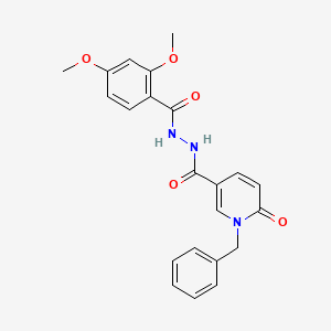molecular formula C22H21N3O5 B3206049 1-benzyl-N'-(2,4-dimethoxybenzoyl)-6-oxo-1,6-dihydropyridine-3-carbohydrazide CAS No. 1040662-72-3