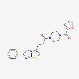 molecular formula C23H22N4O3S B3206660 1-(4-(Furan-2-carbonyl)piperazin-1-yl)-3-(6-phenylimidazo[2,1-b]thiazol-3-yl)propan-1-one CAS No. 1040671-53-1