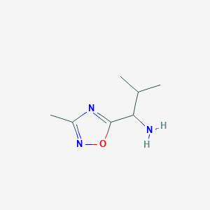 molecular formula C7H13N3O B3207409 2-Methyl-1-(3-methyl-1,2,4-oxadiazol-5-yl)propan-1-amine CAS No. 1041603-68-2
