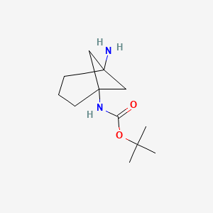 molecular formula C12H22N2O2 B3208214 tert-butyl N-{5-aminobicyclo[3.1.1]heptan-1-yl}carbamate CAS No. 1049607-15-9