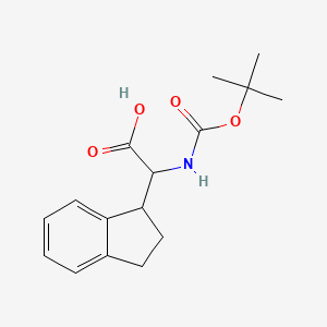 molecular formula C16H21NO4 B3208604 2-([(叔丁氧基)羰基]氨基)-2-(2,3-二氢-1H-茚-1-基)乙酸 CAS No. 1051934-66-7