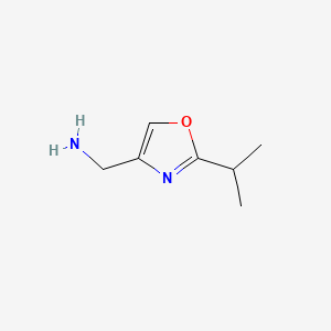 molecular formula C7H12N2O B3208744 (2-Isopropyloxazol-4-yl)methanamine CAS No. 1053059-18-9