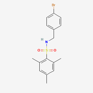 molecular formula C16H18BrNO2S B3208908 N-[(4-bromophenyl)methyl]-2,4,6-trimethylbenzenesulfonamide CAS No. 1055339-40-6