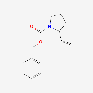 molecular formula C14H17NO2 B3208981 1-Pyrrolidinecarboxylic acid, 2-ethenyl-, phenylmethyl ester CAS No. 105706-77-2