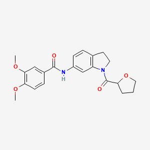 molecular formula C22H24N2O5 B3209100 3,4-dimethoxy-N-(1-(tetrahydrofuran-2-carbonyl)indolin-6-yl)benzamide CAS No. 1058202-67-7