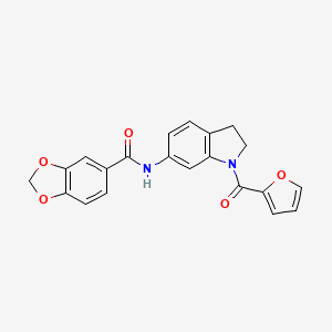 molecular formula C21H16N2O5 B3209277 N-(1-(furan-2-carbonyl)indolin-6-yl)benzo[d][1,3]dioxole-5-carboxamide CAS No. 1058257-37-6