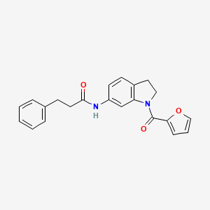 molecular formula C22H20N2O3 B3209442 N-(1-(furan-2-carbonyl)indolin-6-yl)-3-phenylpropanamide CAS No. 1058490-14-4