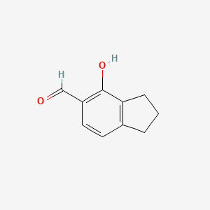 molecular formula C10H10O2 B3211699 4-Hydroxy-2,3-dihydro-1H-indene-5-carbaldehyde CAS No. 1092553-18-8
