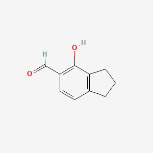 molecular formula C10H10O2 B3211699 4-羟基-2,3-二氢-1H-茚-5-甲醛 CAS No. 1092553-18-8