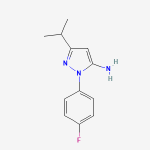 molecular formula C12H14FN3 B3214864 1-(4-Fluorophenyl)-3-isopropyl-1H-pyrazol-5-amine CAS No. 1154199-53-7