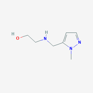 molecular formula C7H13N3O B3215005 2-{[(1-methyl-1H-pyrazol-5-yl)methyl]amino}ethanol CAS No. 1157105-13-9