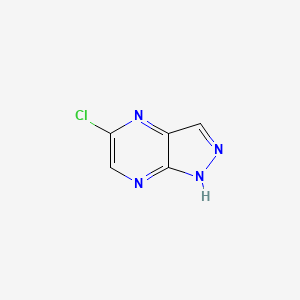 molecular formula C5H3ClN4 B3215639 5-Chloro-1H-pyrazolo[3,4-B]pyrazine CAS No. 116527-52-7