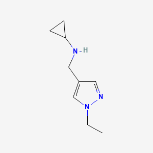 molecular formula C9H15N3 B3216727 N-[(1-乙基-1H-吡唑-4-基)甲基]环丙胺 CAS No. 1172530-74-3