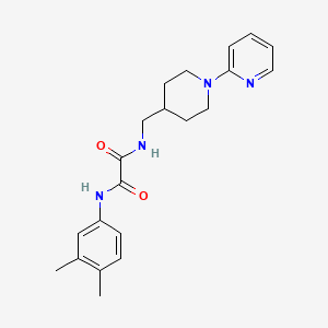 molecular formula C21H26N4O2 B3224565 N1-(3,4-dimethylphenyl)-N2-((1-(pyridin-2-yl)piperidin-4-yl)methyl)oxalamide CAS No. 1234838-95-9