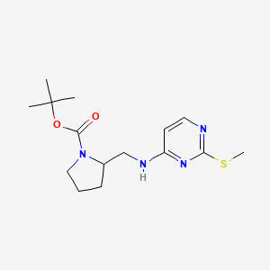 molecular formula C15H24N4O2S B3227969 2-[(2-Methylsulfanyl-pyrimidin-4-ylamino)-methyl]-pyrrolidine-1-carboxylic acid tert-butyl ester CAS No. 1261235-35-1