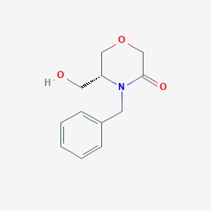 molecular formula C12H15NO3 B3228630 (R)-4-Benzyl-5-hydroxymethyl-morpholin-3-one CAS No. 1266238-73-6