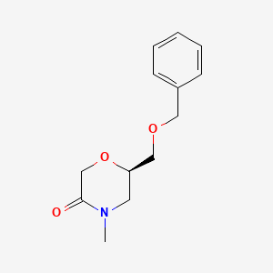 molecular formula C13H17NO3 B3228741 3-Morpholinone, 4-methyl-6-[(phenylmethoxy)methyl]-, (6R)- CAS No. 1268520-35-9