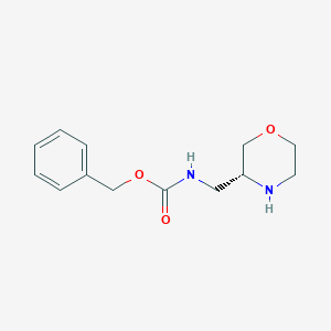 molecular formula C13H18N2O3 B3230879 (R)-Benzyl (morpholin-3-ylmethyl)carbamate hydrochloride CAS No. 1312161-60-6