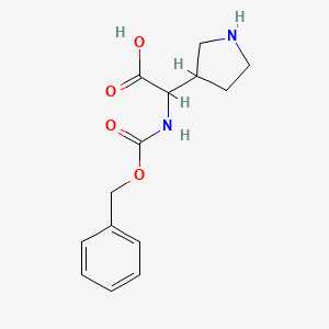 molecular formula C14H18N2O4 B3230970 3-Pyrrolidineacetic acid, a-[[(phenylmethoxy)carbonyl]amino]- CAS No. 1313032-61-9