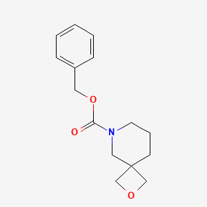 molecular formula C15H19NO3 B3231008 2-Oxa-6-aza-spiro[3.5]nonane-6-carboxylic acid benzyl ester CAS No. 1313369-58-2