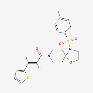 (E)-3-(thiophen-2-yl)-1-(4-tosyl-1-oxa-4,8-diazaspiro[4.5]decan-8-yl)prop-2-en-1-one