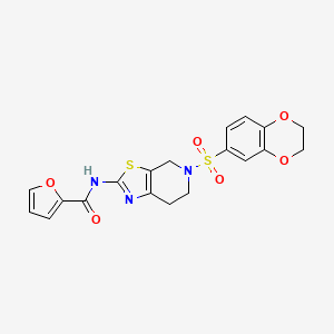 molecular formula C19H17N3O6S2 B3233174 N-(5-((2,3-dihydrobenzo[b][1,4]dioxin-6-yl)sulfonyl)-4,5,6,7-tetrahydrothiazolo[5,4-c]pyridin-2-yl)furan-2-carboxamide CAS No. 1351655-08-7