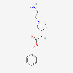 molecular formula C14H21N3O2 B3233529 [1-(2-Amino-ethyl)-pyrrolidin-3-yl]-carbamic acid benzyl ester CAS No. 1353945-85-3
