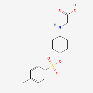 molecular formula C15H21NO5S B3233563 [4-(Toluene-4-sulfonyloxy)-cyclohexylamino]-acetic acid CAS No. 1353946-35-6