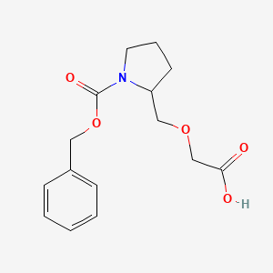molecular formula C15H19NO5 B3233750 2-Carboxymethoxymethyl-pyrrolidine-1-carboxylic acid benzyl ester CAS No. 1353953-71-5
