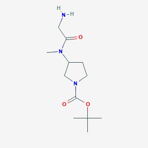 molecular formula C12H23N3O3 B3233897 3-[(2-Amino-acetyl)-methyl-amino]-pyrrolidine-1-carboxylic acid tert-butyl ester CAS No. 1353957-32-0