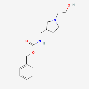 molecular formula C15H22N2O3 B3234336 [1-(2-Hydroxy-ethyl)-pyrrolidin-3-ylmethyl]-carbamic acid benzyl ester CAS No. 1353972-69-6