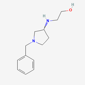 molecular formula C13H20N2O B3235256 2-((R)-1-Benzyl-pyrrolidin-3-ylamino)-ethanol CAS No. 1353999-74-2