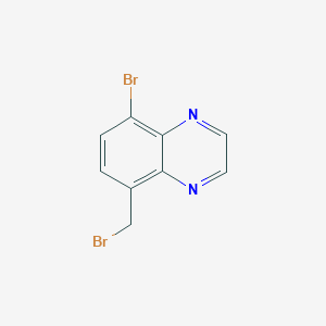 B3236052 5-Bromo-8-(bromomethyl)quinoxaline CAS No. 1360599-45-6