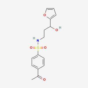molecular formula C15H17NO5S B3239682 4-acetyl-N-(3-(furan-2-yl)-3-hydroxypropyl)benzenesulfonamide CAS No. 1421473-62-2