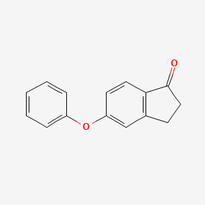 molecular formula C15H12O2 B3239955 5-Phenoxyindan-1-one CAS No. 142369-18-4