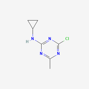 molecular formula C7H9ClN4 B3241753 1,3,5-Triazin-2-amine, 4-chloro-N-cyclopropyl-6-methyl- CAS No. 148312-27-0
