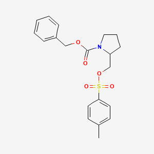 molecular formula C20H23NO5S B3243860 2-(甲苯-4-磺酰氧甲基)-吡咯烷-1-羧酸苄酯 CAS No. 159748-96-6