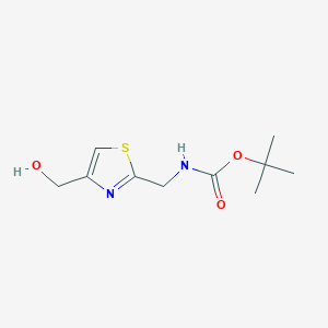 B3245082 tert-butyl N-{[4-(hydroxymethyl)-1,3-thiazol-2-yl]methyl}carbamate CAS No. 165667-51-6