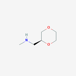 molecular formula C6H13NO2 B3247540 1-[(2S)-1,4-dioxan-2-yl]-N-methylmethanamine CAS No. 1821837-10-8