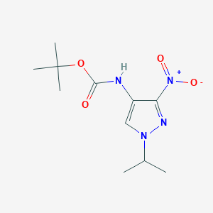 molecular formula C11H18N4O4 B3252461 t-Butyl (1-isopropyl-3-nitro-1H-pyrazol-4-yl)carbamate CAS No. 2171314-38-6