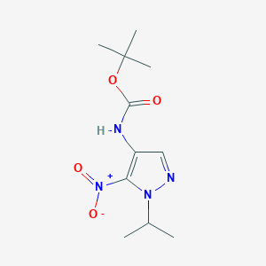 molecular formula C11H18N4O4 B3252507 t-Butyl (1-isopropyl-5-nitro-1H-pyrazol-4-yl)carbamate CAS No. 2171317-49-8