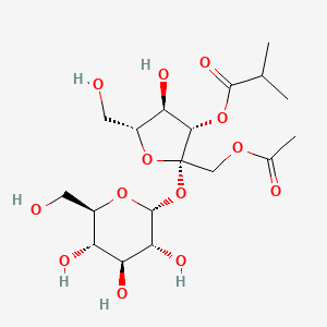 molecular formula C18H30O13 B3261564 [(2S,3S,4R,5R)-2-(Acetyloxymethyl)-4-hydroxy-5-(hydroxymethyl)-2-[(2R,3R,4S,5S,6R)-3,4,5-trihydroxy-6-(hydroxymethyl)oxan-2-yl]oxyoxolan-3-yl] 2-methylpropanoate CAS No. 34482-63-8