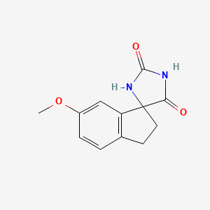 molecular formula C12H12N2O3 B3277956 6'-Methoxy-2',3'-dihydrospiro[imidazolidine-4,1'-indene]-2,5-dione CAS No. 66892-37-3
